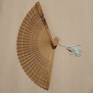 Wooden Hand Fan with Intricate Design and Light Blue Tassel in Case